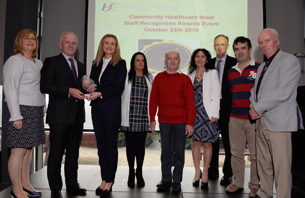 Overall Winner Innovative Project: Heartsaver CPR AED Training for Family Carers Tony Canavan, Chief Officer presenting the award to Michelle Harrison, Co-ordinator, Carers Department, Social Care and the team.