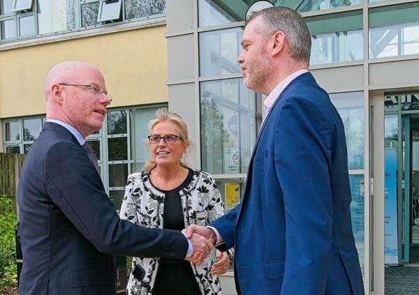 Minister for Health Stephen Donnelly is greeted by Kate Killeen-White, Regional Executive Officer, HSE Dublin & Midlands and Kieran McDonald, General Manager, Naas General Hospital.